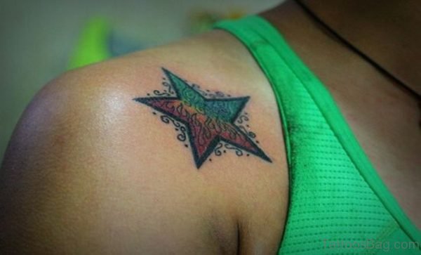 Star Tattoo On Right Shoulder