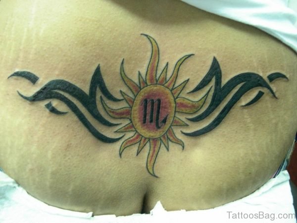 Sun And Tribal Tattoo