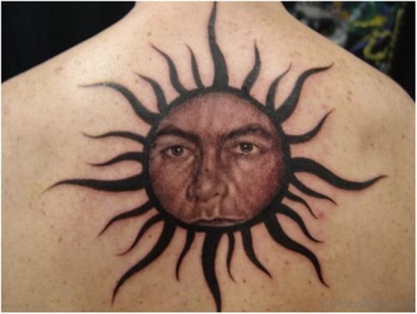 Sun Face Tattoo On Back