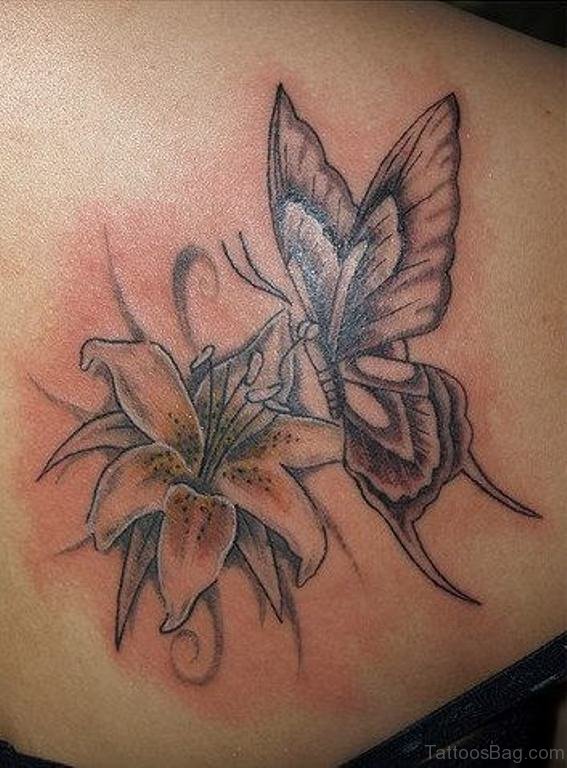 Sweet Lily Flower And Butterfly Tattoo
