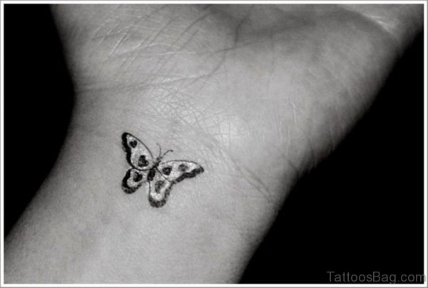 Tiny Butterfly Tattoo On Wrist