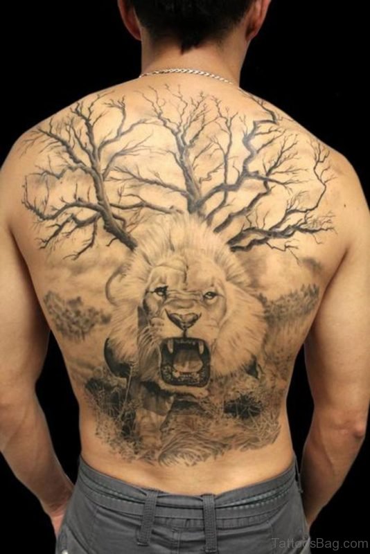 Tree And Lion Tattoo