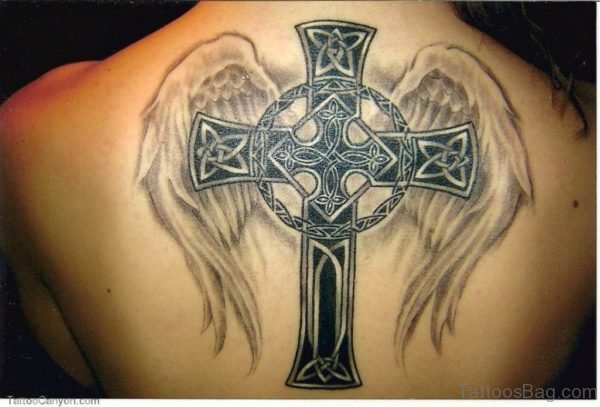 Tribal Cross And Wings Tattoo