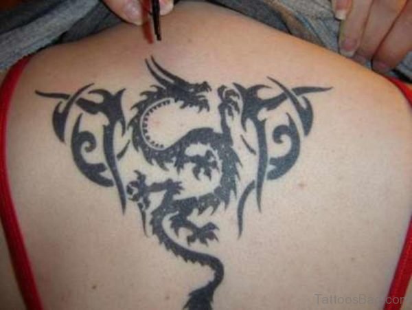 Tribal Dragon Tattoo On Upper Back
