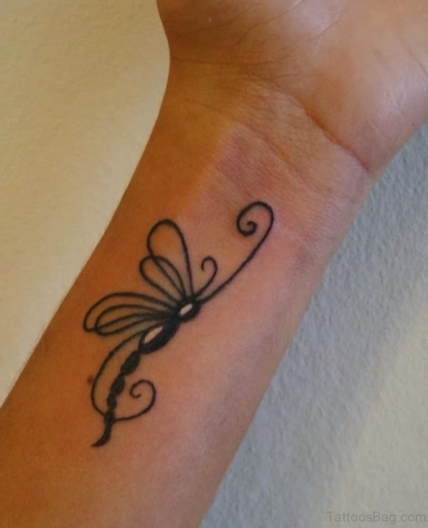 Tribal Dragonfly Tattoo On Wrist
