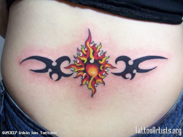 Tribal Sun Tattoo On Lower Back