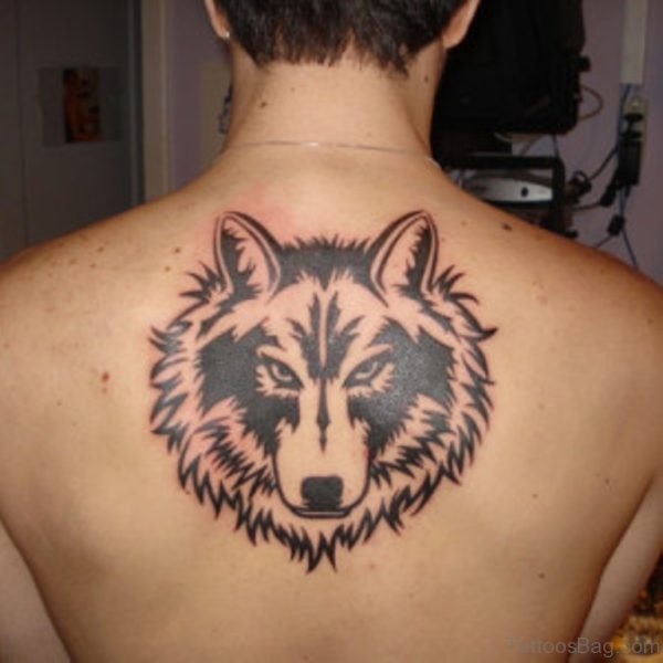 Tribal Wolf Tattoo On Upper Back