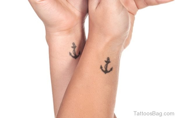 Two Anchors Tattoo On Wrist