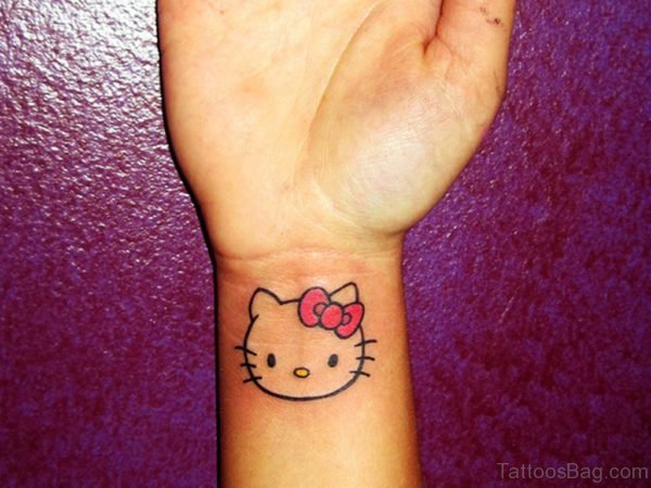 Typical kitty Wrist Tattoo