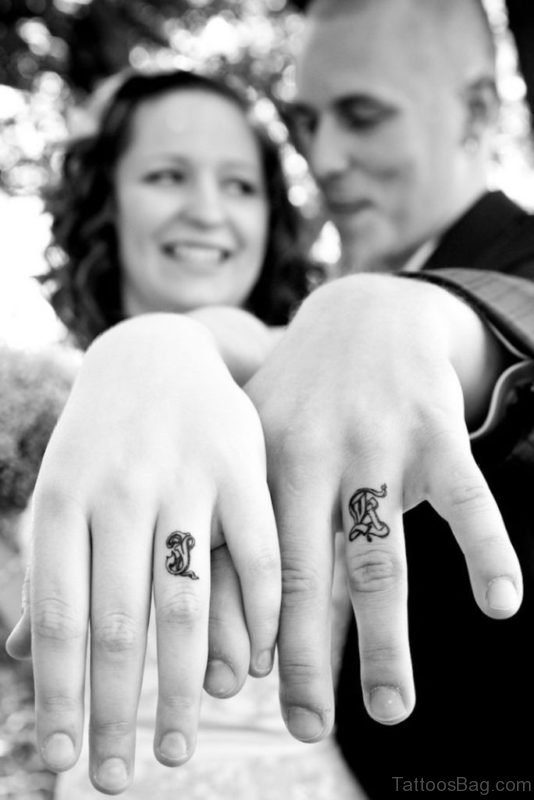 Wedding Ring Finger Tattoo