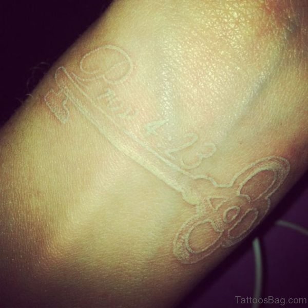 White Key Tattoo On Wrist