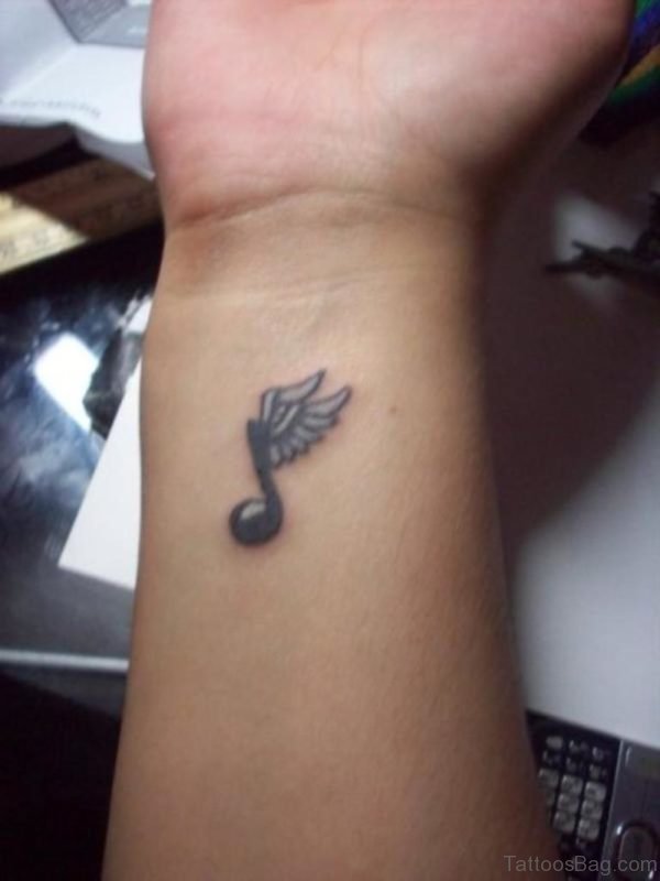 Winged Music Note Tattoo