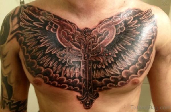 Wings And Cross Tattoo On Chest