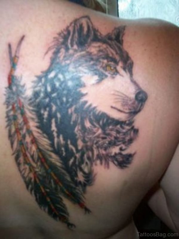 Wolf And Feather Tattoo