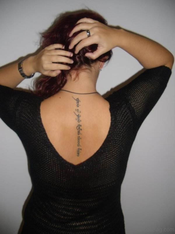 Wonderful Arabic Wording Tattoo On Back