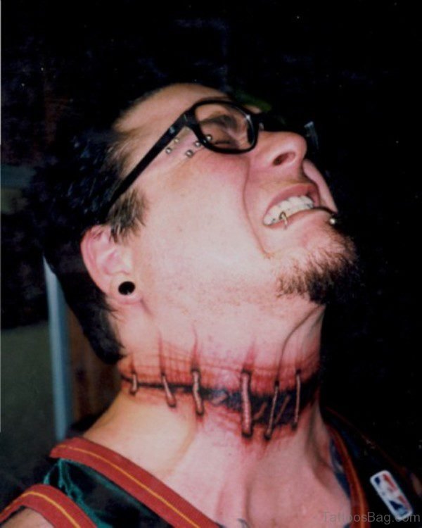 Wonderful Ripped Skin Tattoo On neck