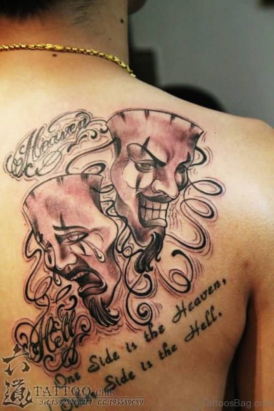 Wording And Mask Tattoo