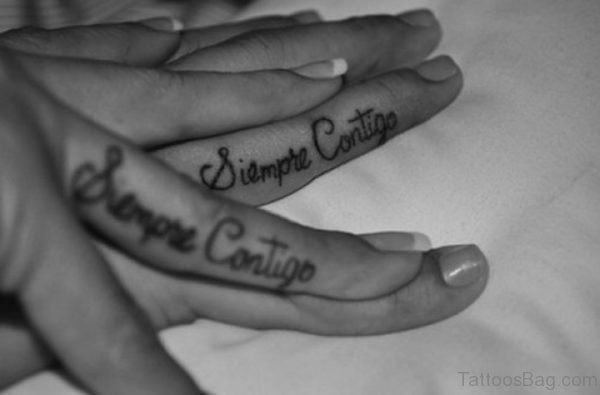 Wording Tattoo On Finger 