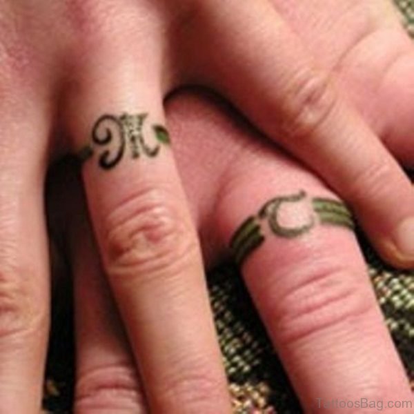 Green Ring Tattoo