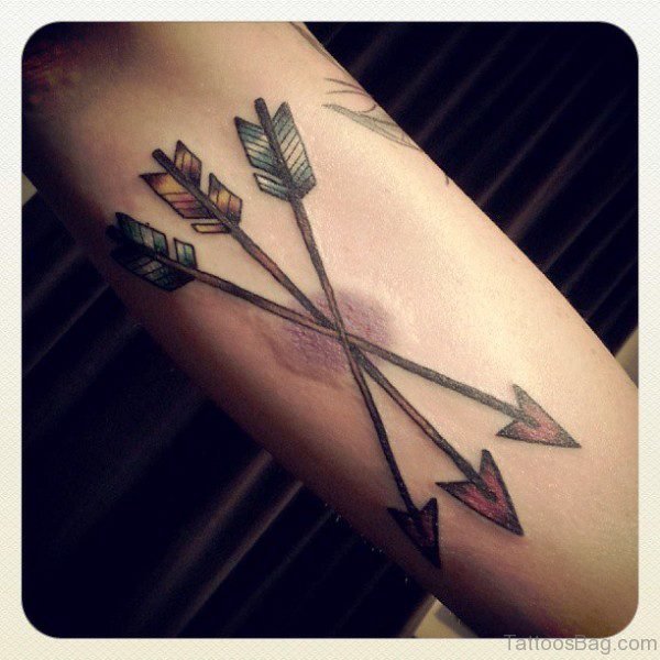 3 Cross Arrow Tattoo On Arm 