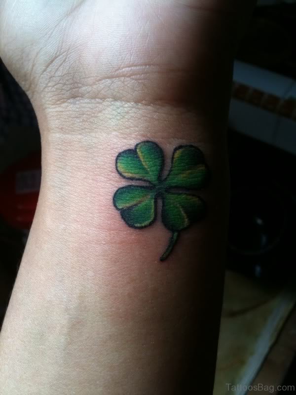 Adorable Four Leaf Tattoo On Wrist