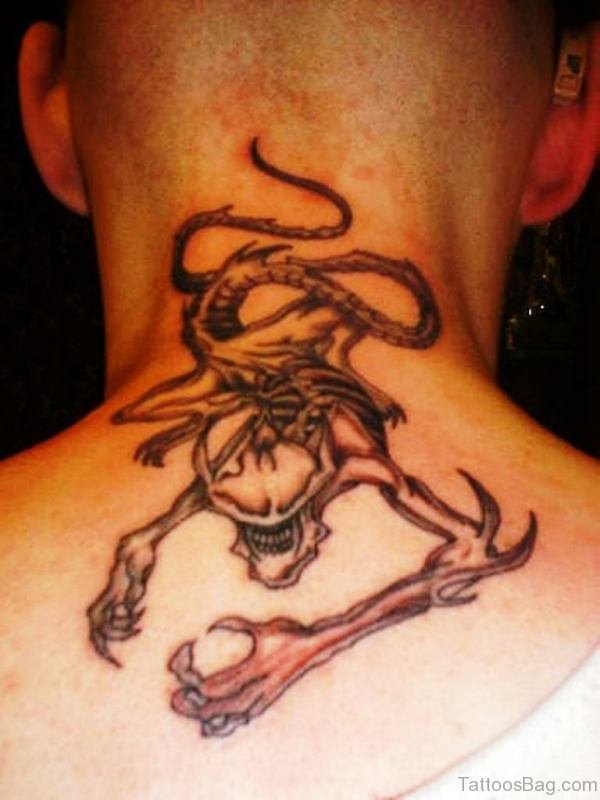 Alien Skull Tattoo On Back Neck