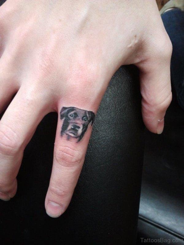 Amazing Dog Finger Tattoo