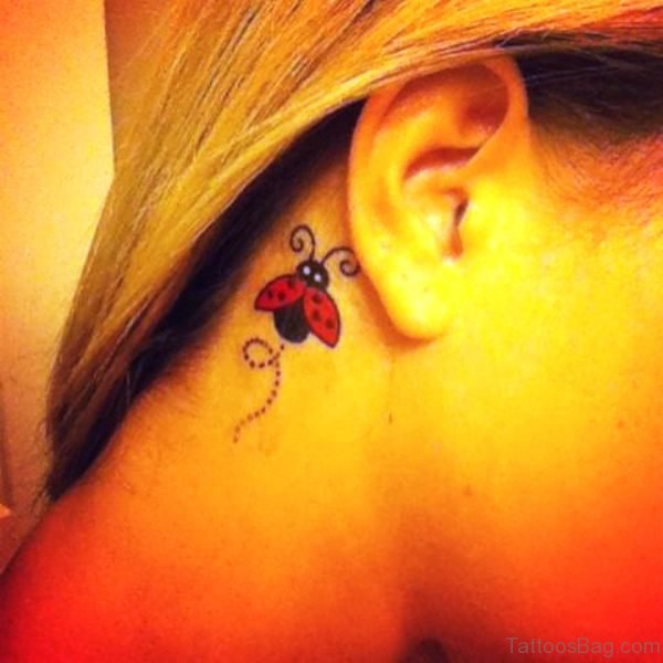 Amazing Ladybug Tattoo Behind Ear 