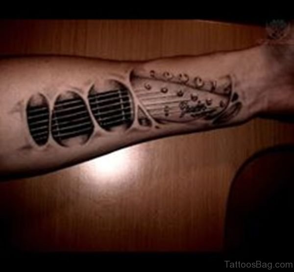 Amazing Ripped Skin Guitar Tattoo