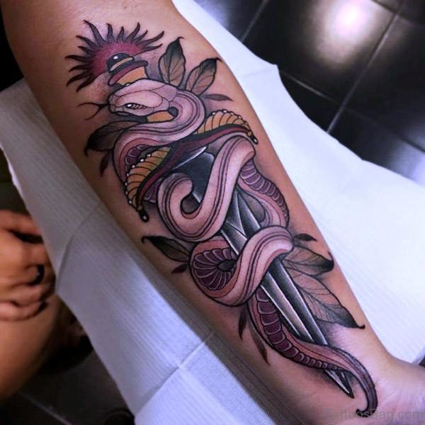 Amazing Snake With Dagger Tattoo On Arm