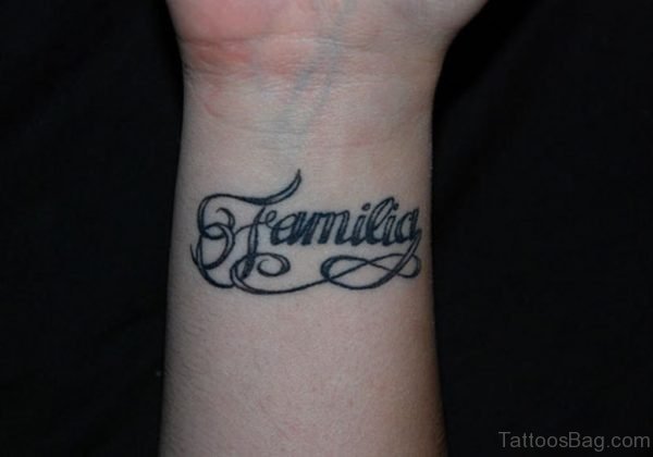 Ambigram Family Word Tattoo On Wrist