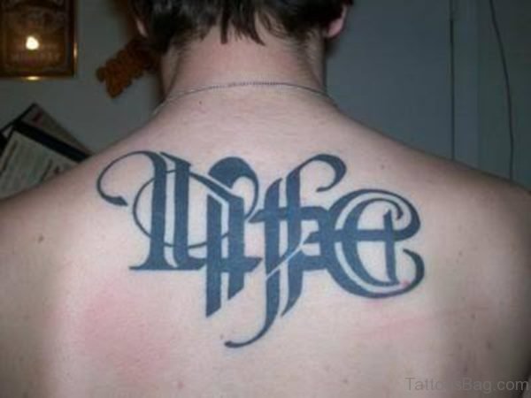 Ambigram Life Tattoo On Upper Back