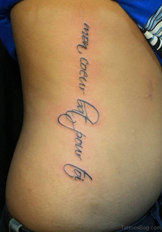 Ambigram Wording Tattoo On Rib