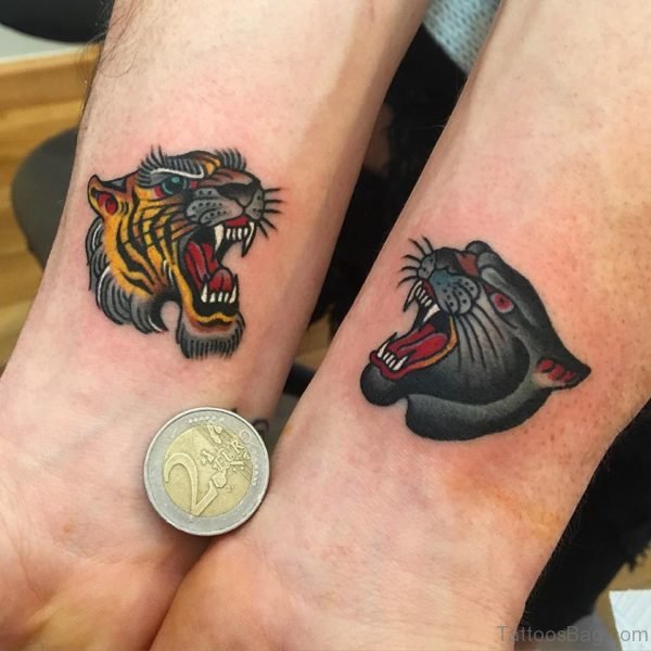 Angry Colorful Tigers Tattoo On Wrist