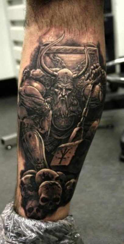 Angry Viking And Skulls Tattoo On Leg
