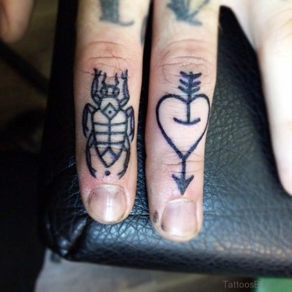 Arrow With Heart Tattoo On Finger