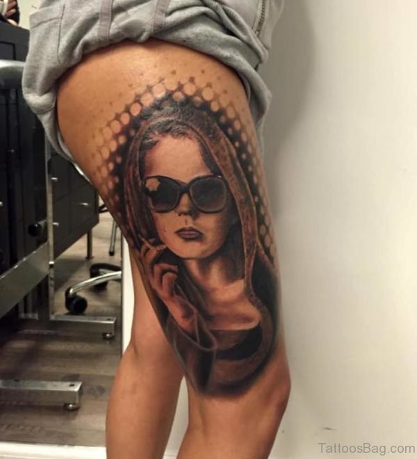 Attarctive Portrait Tattoo On Thigh