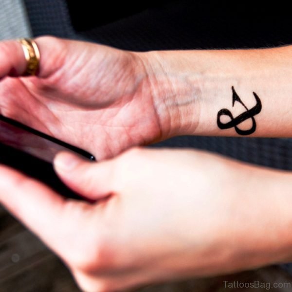 Attractive Ampersand Wrist Tattoo 