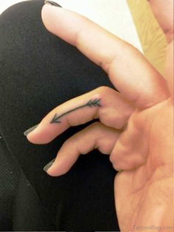 Attractive Arrow Tattoo On Finger