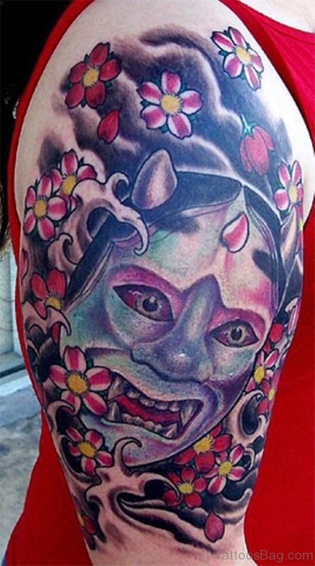 Attractive Oni Mask Tattoo On Shoulder