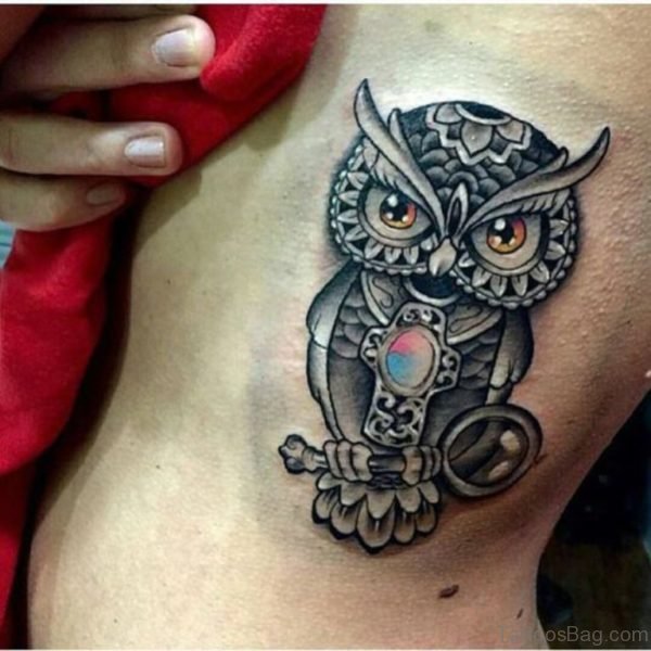 Attractive Owl Tattoo On Rib