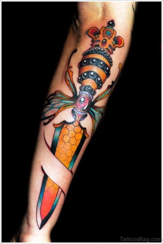 Awesome Colorful Dagger Tattoo On Arm
