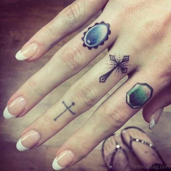 Cross Tattoo On Finger