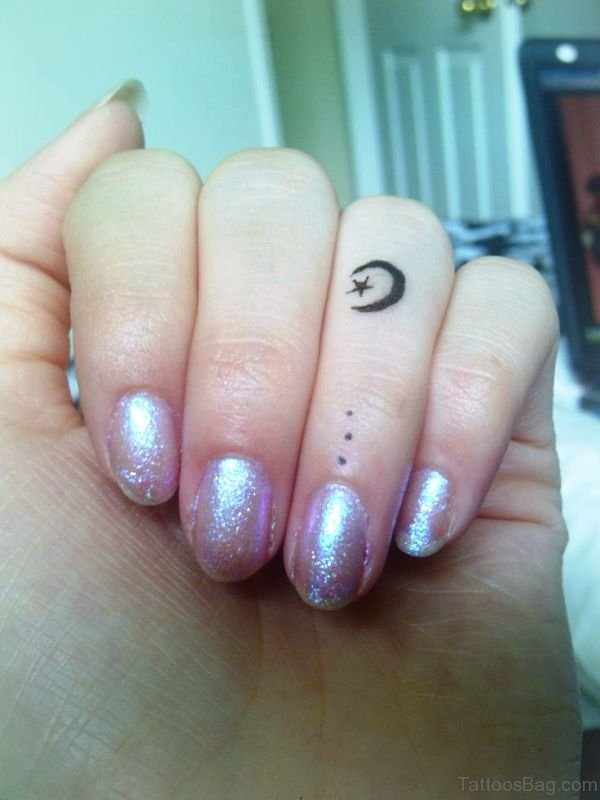 Awesome Moon And Star Tattoo On Finger