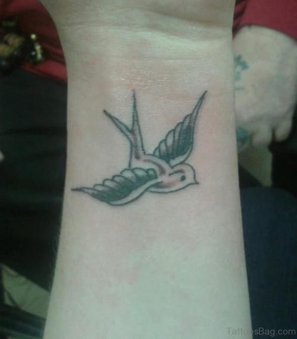 Awesome Swallow Tattoo On Wrist