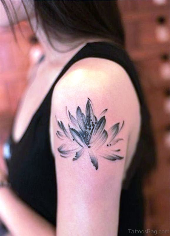Black Ink Tattoo On Left Shoulder