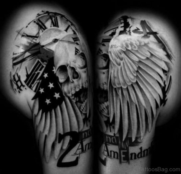 Black And White Skull Wings Tattoo