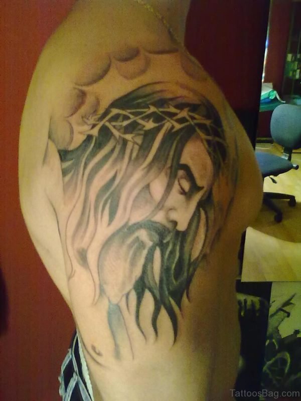 Barbed Jesus Head Tattoo On Right Shoulder
