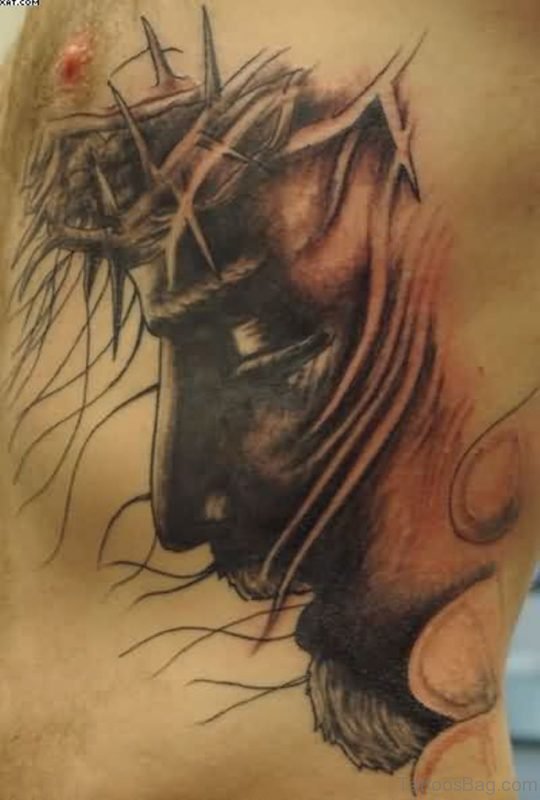 Barbed Jesus Tattoo On Rib