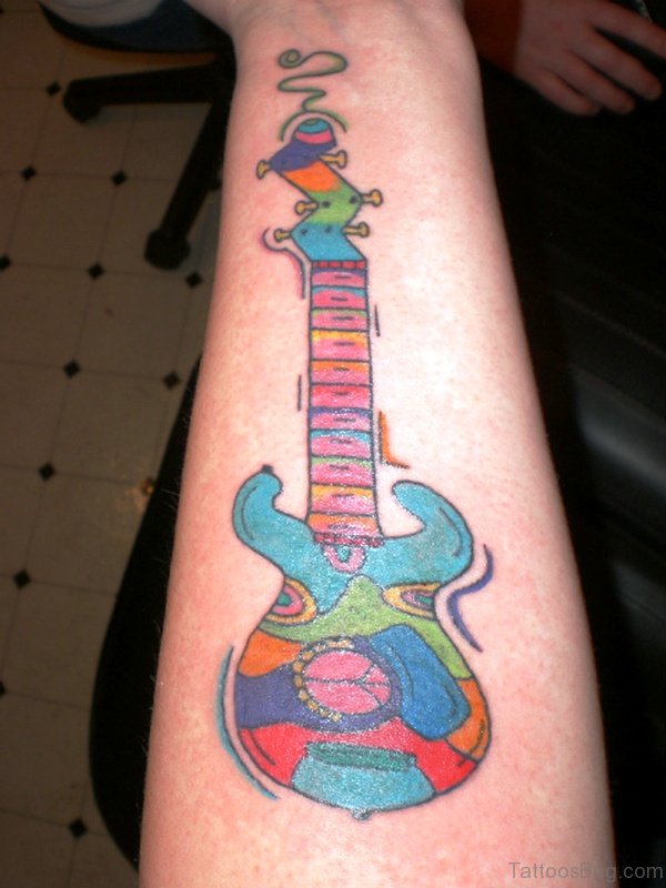 Beautiful Colorful Guitar Tattoo On Forearm